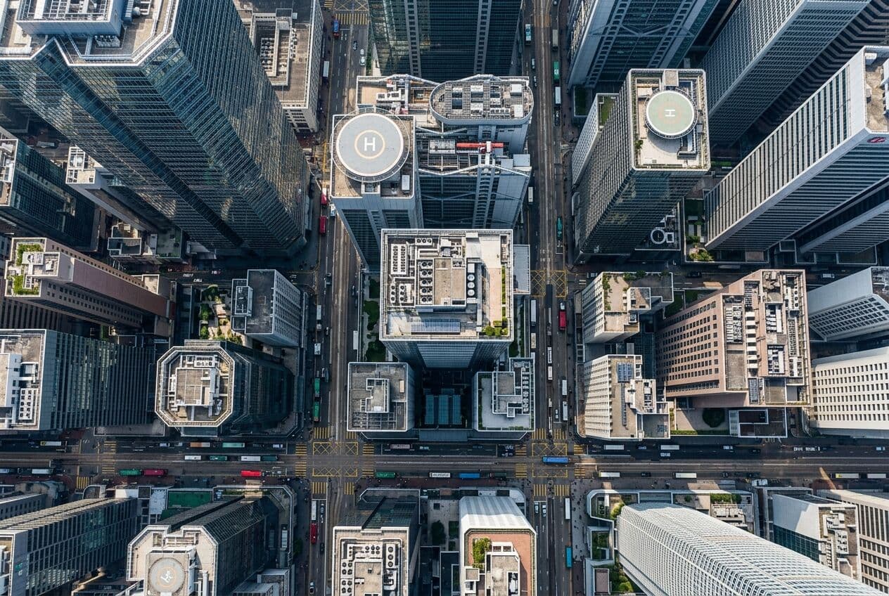 Aerial view of skyscraper rooftops in a financial district