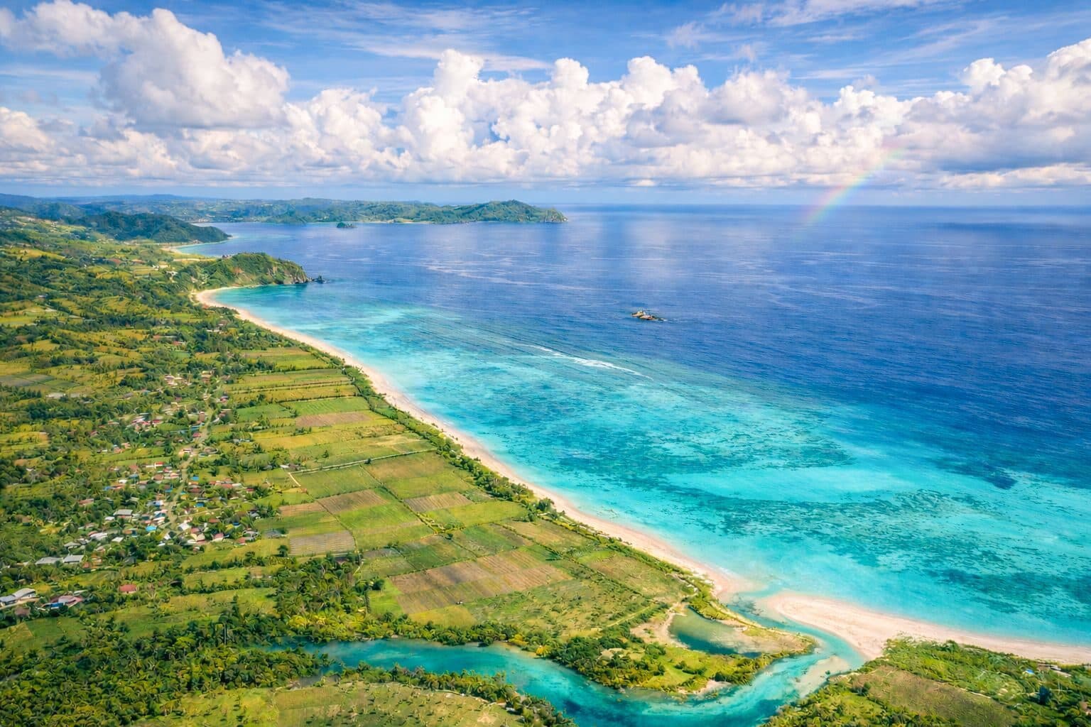 Aerial view of the West Lombok coastline, villages and farmland